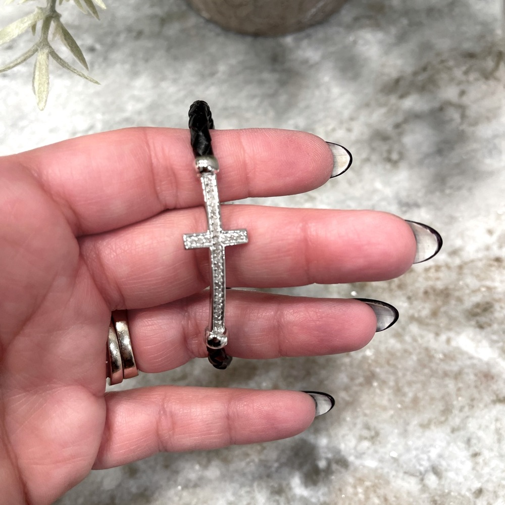 Silver cross with leather braid bracelet